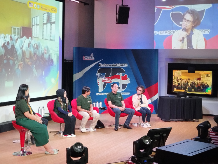 Preserving regional languages: Renowned director Riri Riza (right) speaks on March 7, 2024, during the launch of two digital dictionaries at @america in Jakarta. The two digital dictionary projects aim to preserve Makassar and Banjarese languages, spoken by people in South Sulawesi and Kalimantan Island, respectively.