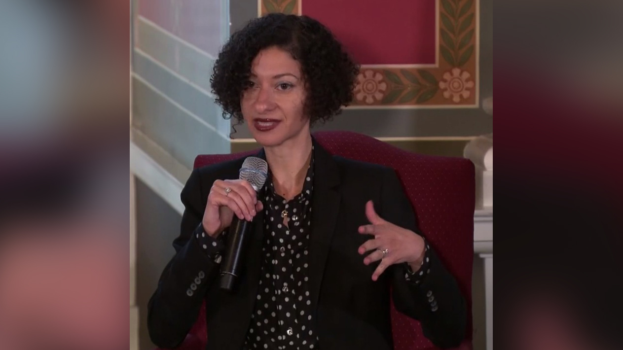 Cosmologist and theoretical physicist Chanda Presco-Weinstein speaking at the Becoming Interplanetary seminar in 2018.