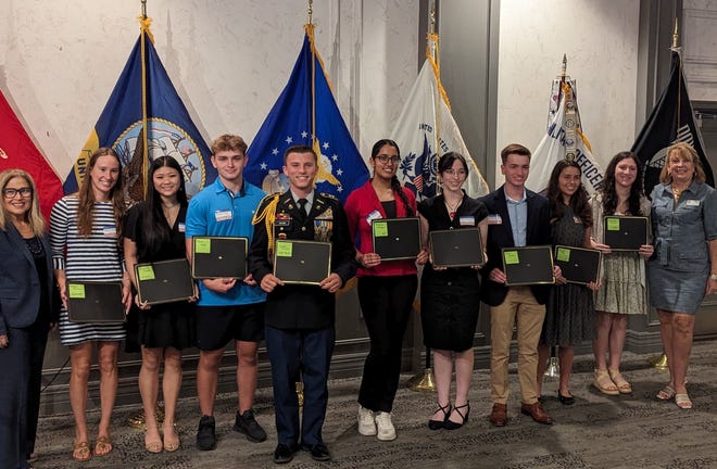 Sarasota Mayor Liz Alpert was the keynote speaker at the Military Officers Association Sarasota Scholarship Luncheon on May 8. Five JROTC and 12 merit scholarships ($3,000 each) were awarded to Sarasota County seniors based on leadership and community service. Attending the ceremony with Alpert, from left, were Addy Domian, Lizzy Mopps, Marco Vegh, Hayden Wilding, Nishalle Uthuppan, Ayla Edwards, Ethan Hylwa, Margaret Toth, Danielle Vassos, and scholarship chair Susan Warmington. Visit sarasotamoaa.com.