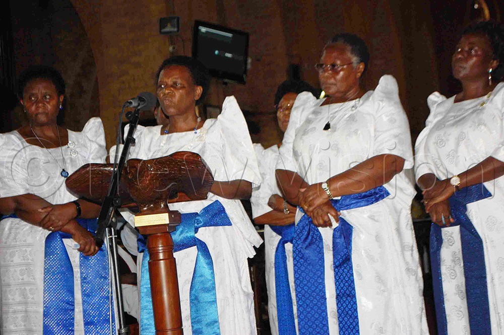 Bishop Senyimba's wife, the Rev. Esther Nagginda Senyimba (behind microphone) eulogisng her husband during the memorial service at Namirembe Cathedral. With her are her colleagues the Prelates' wives. (Photo by Mathias Mazinga)