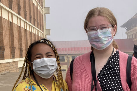 Narindra Andrisoamampianina '23 and Madeline Tatu smile in Madagascar