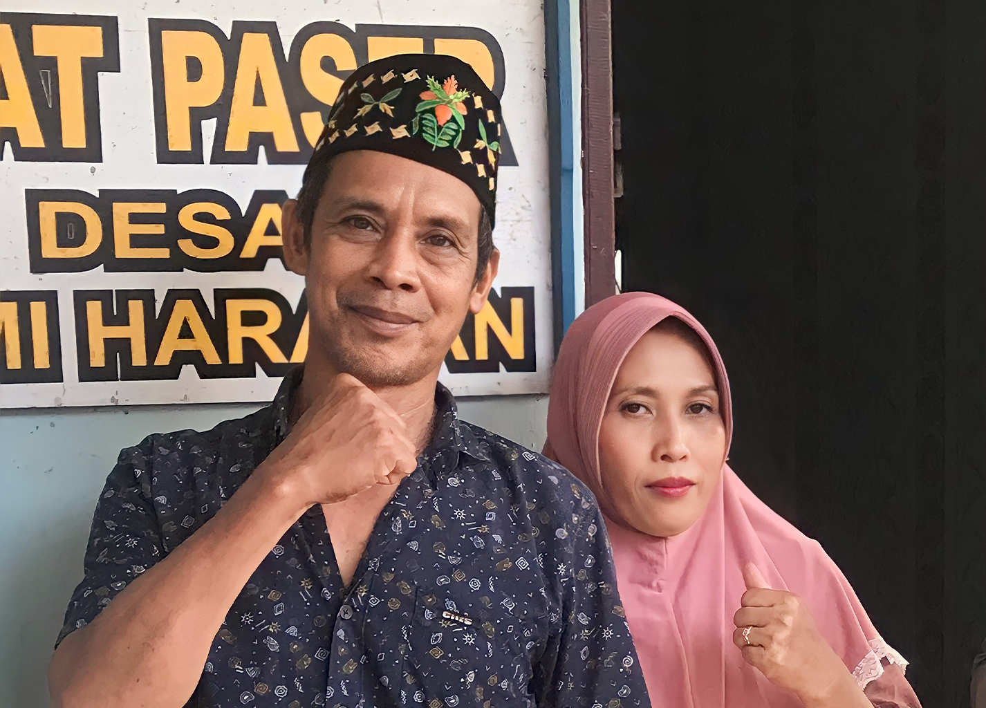 Syarak, the customary elder in Bumi Harapan, with his wife.