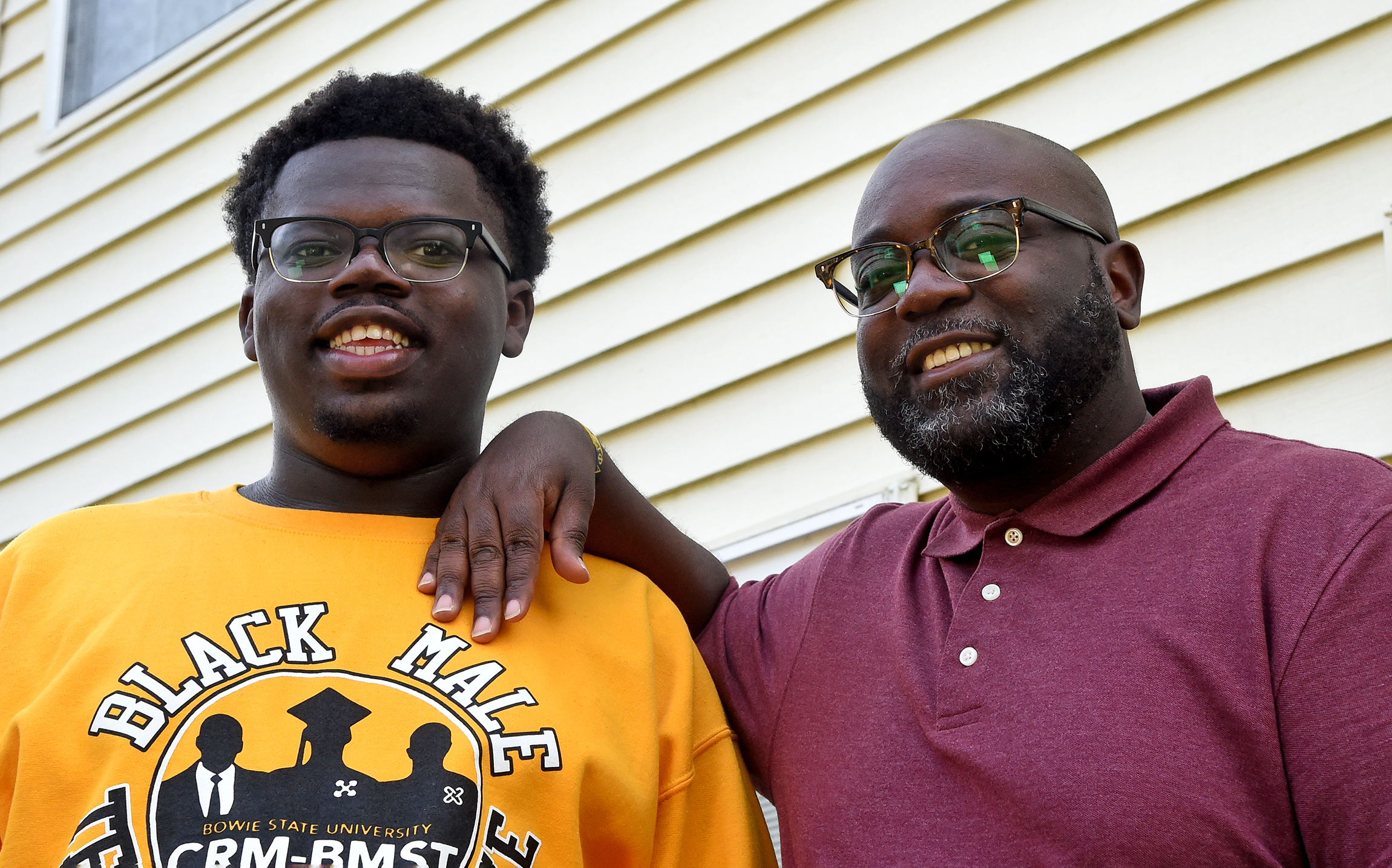 Anthone Bond, right, has been a teacher for 29 years. His son Zaire, left, is hoping to become a teacher, as well. Zaire is a high school senior who is participating in a program through Bowie State University that helps prepare Black men for careers as teachers.  Sept. 16, 2022 Anthone Bond, right, has been a teacher for 29 years. His son Zaire, left, is hoping to become a teacher, as well. Zaire is a high school senior who is participating in a program through Bowie State University that helps prepare Black men for careers as teachers.  Sept. 16, 2022