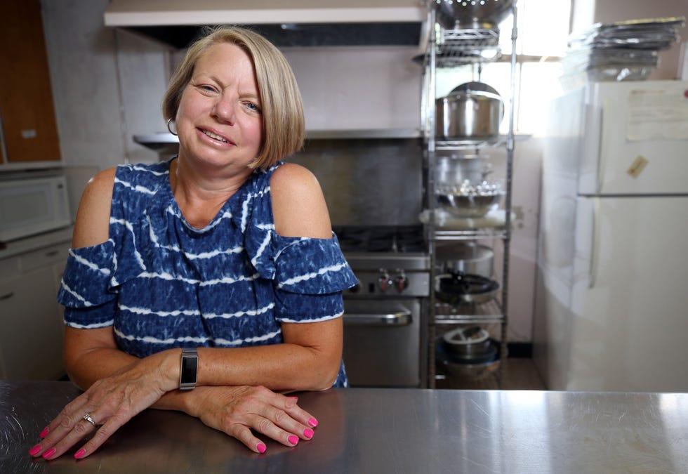 Debra Andres cooks meals at the Westside Free Store Ministries on South Powell Avenue in Columbus.