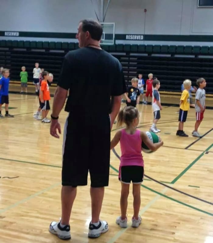McKenna (right) with her dad Aaron at a kid's camp in Montana.