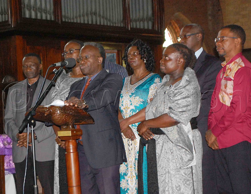 Bishop Senyimba's children led by Prince John Kayima (behind microphone) eulogising their father during the memorial service at Namirembe Cathedral. (Photo by Mathias Mazinga)