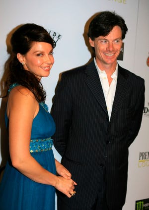 HOLLYWOOD - NOVEMBER 09: Actress Ashley Judd (L) and Premiere Magazine Publisher Paul Turcotte arrive at the Premiere Lounge "Come Early Morning" party during AFI FEST 2006 Presented By Audi held at Sideways Lounge on November 9, 2006 in Hollywood, California. (Photo by Katy Winn/Getty Images) Katy Winn, ©istockphoto.com/EdStock (courtesy)