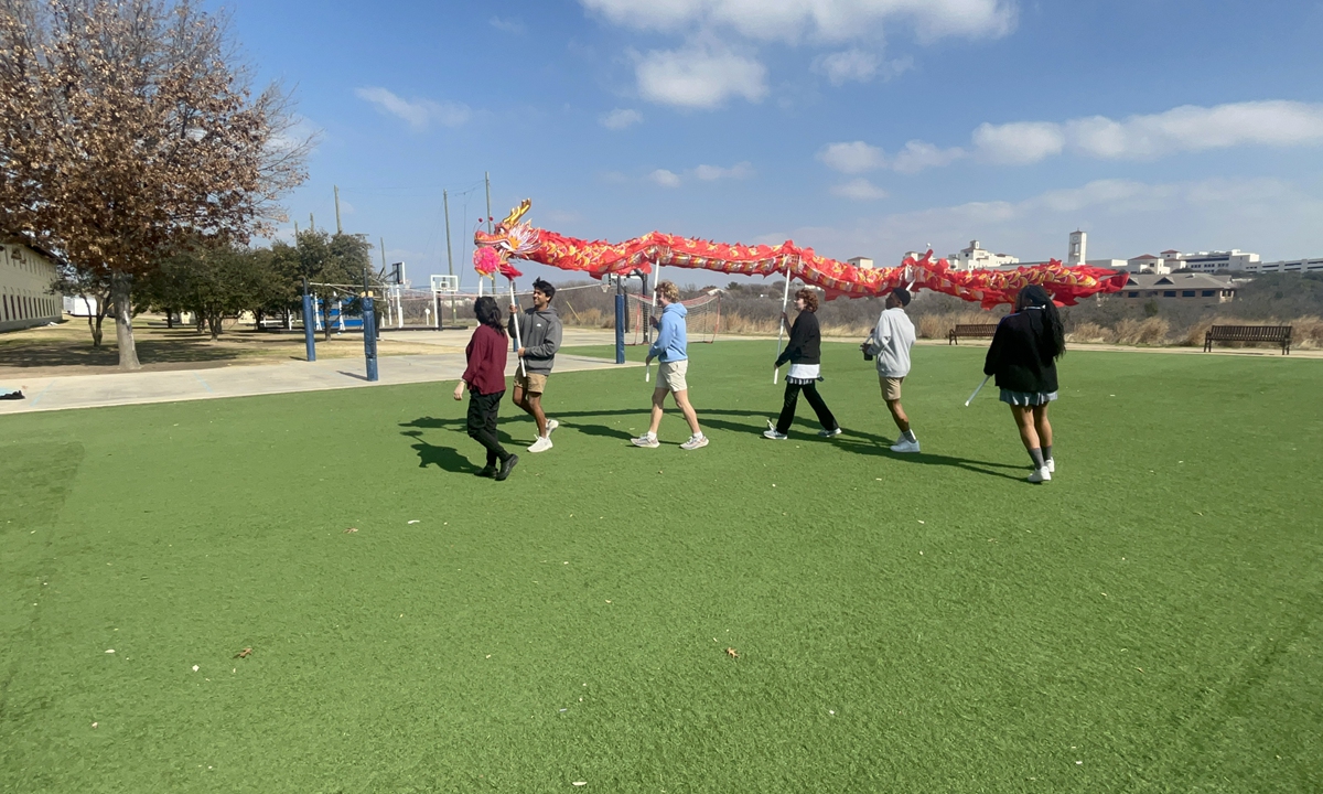 Trinity Valley School students in Chinese class engaging in an undulating and rhythmic dragon dance Photo:Courtesy of Zeng Zirui
