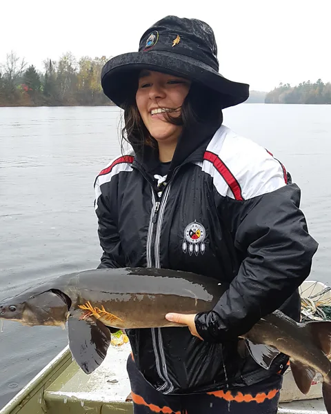 Dolcy Meness Dolcy Meness fishing in her nation’s traditional territory, Kitigan-Zibi-Anishinabeg (Credit: Dolcy Meness)