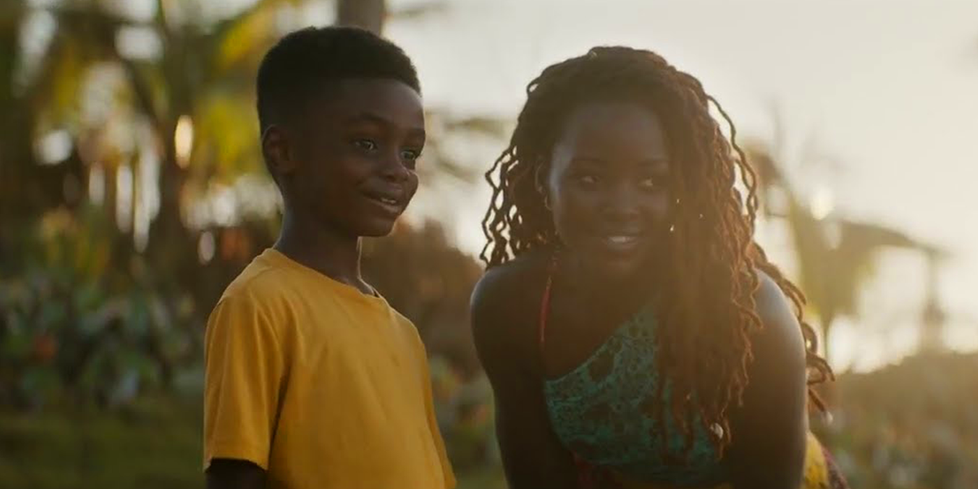 toussaint and nakia stood smiling in black panther 2