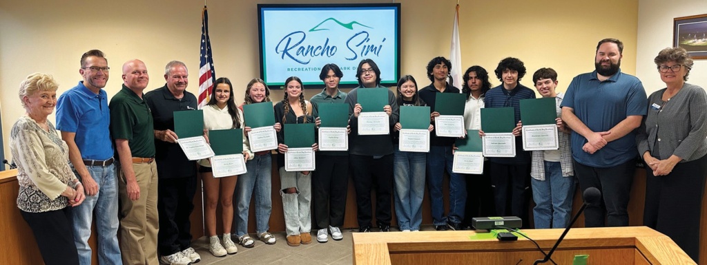 ECO-FRIENDLY DEEDS—From left, Rancho Simi Recreation and Park District board members Elaine Freeman, Ed Abele and Brian Dennert; Monte Vista Principal Stephen Pietrolungo; Simi Valley students Jetta Rose, Sophia Piscitello and Chloe Dennert; Circle K International members Dylan Dang, Thomas Arreola and Raquel Kanalz; Ecos Chicos members Noe Cisneros, Occie Real, Adrian Quezada and Damian Carrillo; and RSRPD board members Josh Gray and Kate O’Brien. Courtesy of RSRPD