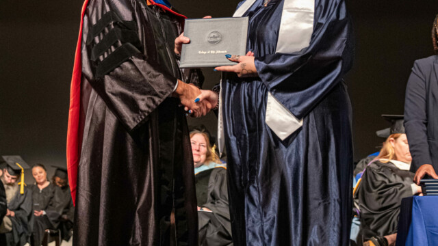 Crystal David, Fall 2023 COA Scholar of Global Distinction Award Recipient (pictured with President Bagwell)