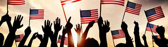 People holding the American flag People holding the American flag