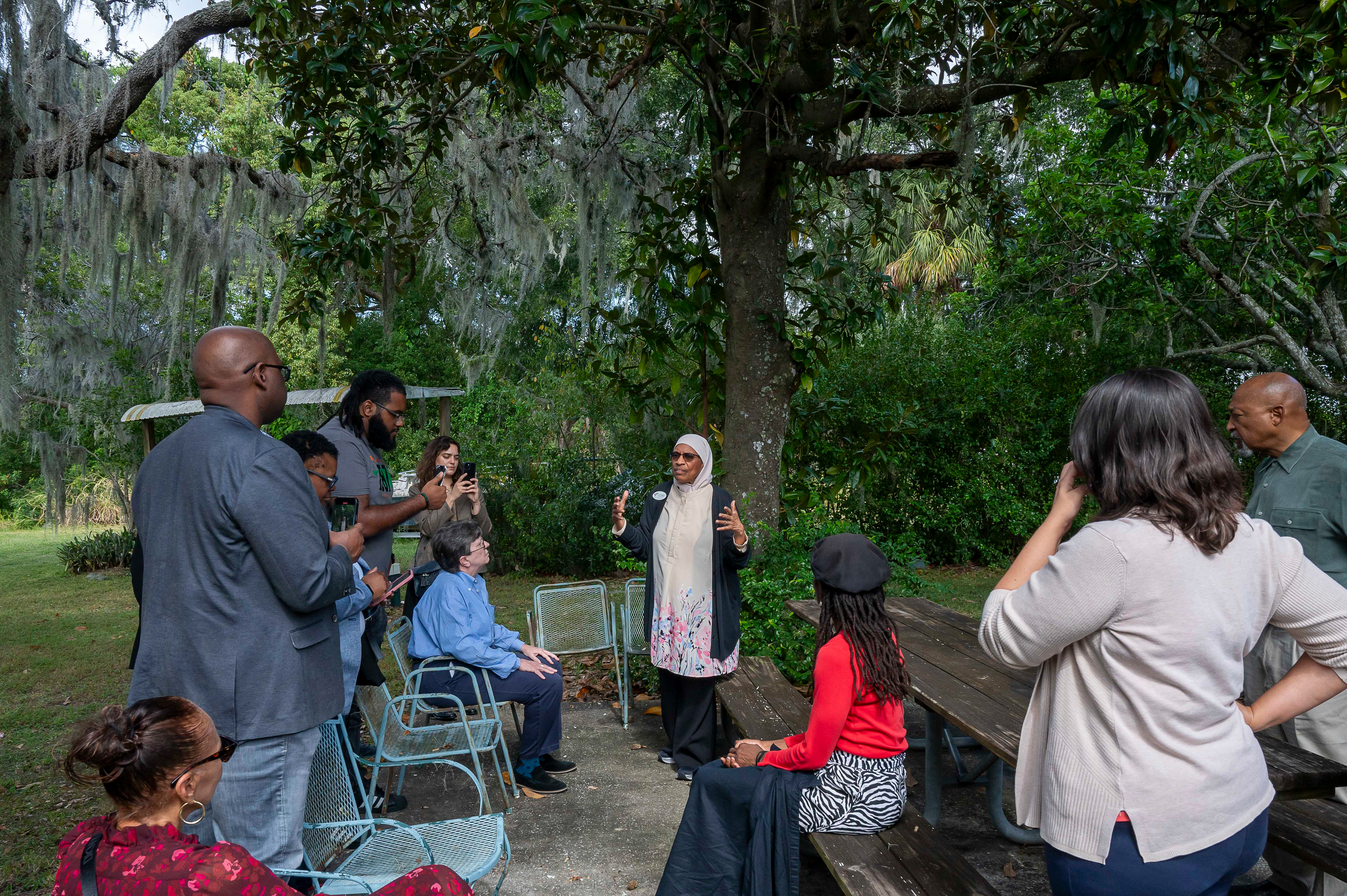 People gather in an outdoor space.
