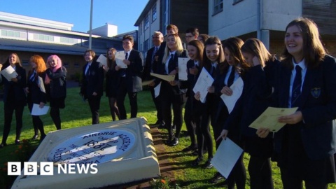 Pass rates hold steady as thousands receive exam results