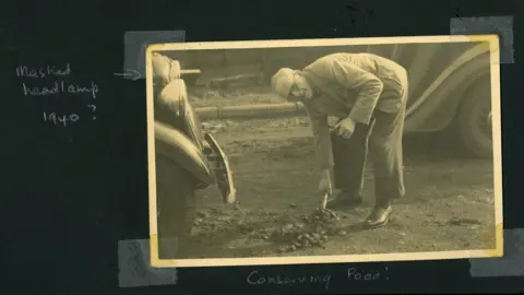 Betty Richards Betty Richard's father shovelling horse manure on a road