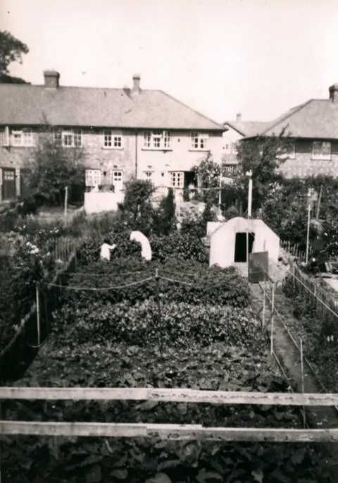 Freda Peach Freda Peach's mother and sister in their council house garden