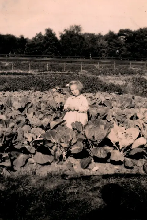 Christine Regas  Christine Regas as a young girl on allotment