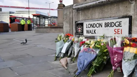 AFP Flowers at London Bridge walk