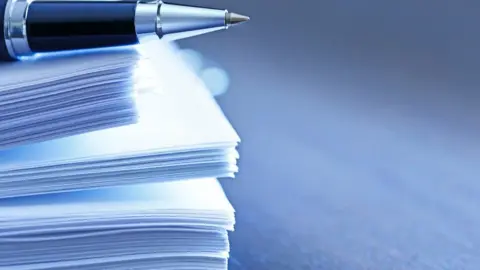 Getty Images Pile of documents