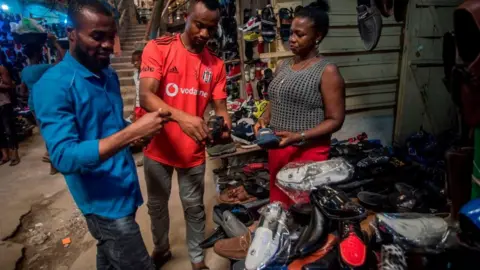 Getty Images Traders at Aba market