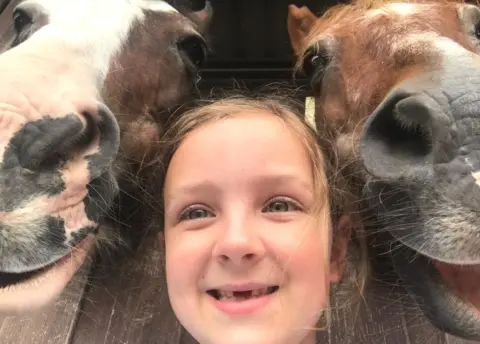 Belle Clarkson Girl with horses