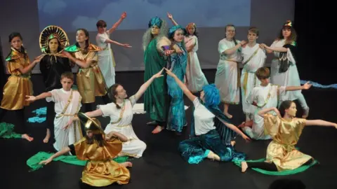 Best Theatre Arts Children on stage in classical costumes at Best Theatre Arts