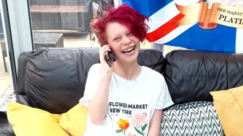 Amanda Conway Hannah on her phone