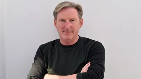 Mark Allan/BBC Adrian Dunbar