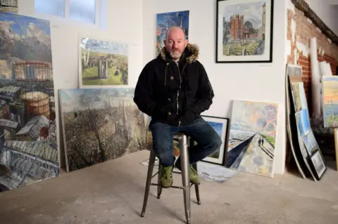 Laurence Cawley/BBC David in his art gallery