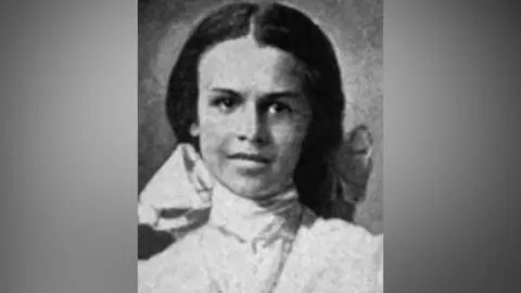 Babbel A yearbook photo of Marie C Bolden in 1908