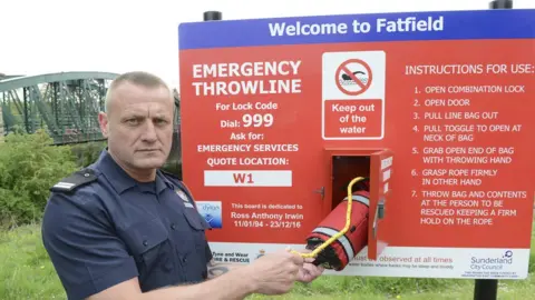 TWFRS Dave Irwin holding a throw bag at Fatfield along the River Wear