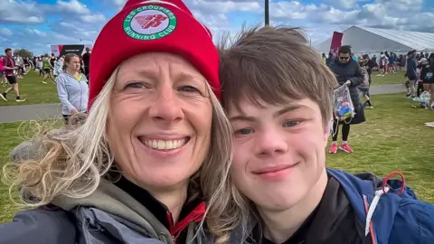 Family photo Lloyd and mum Ceri at the start of the London Marathon