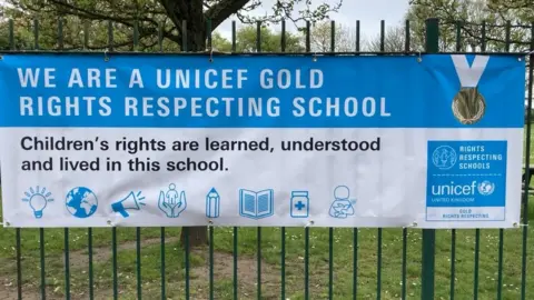 Unicef banner outside the school