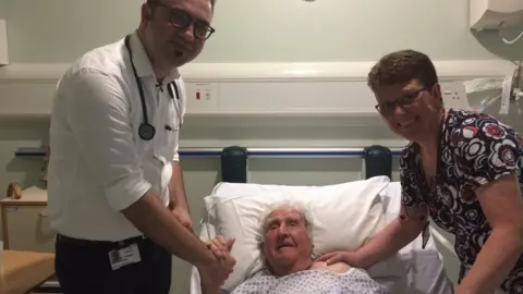 BBC Refugee doctor Rouni Youssef with his mentor Dr Sue Jones and elderly patient