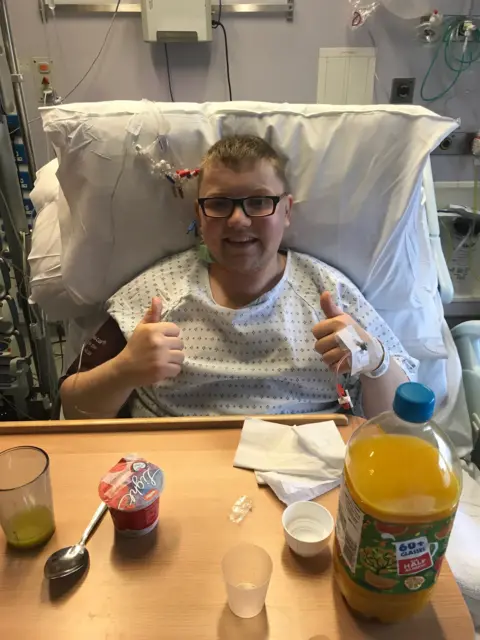 Stuart Hutchison Stuart giving thumbs up in hospital