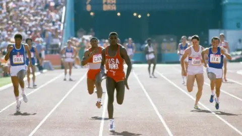 Focus on Sport/Getty Images Carl Lewis leads the 100m at the 1984 Olympics
