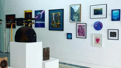 PZ Arts Lab A photo of the gallery and paintings on the wall