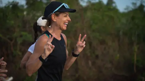 Project 1000 Natalie Dau during her run from Thailand to Singapore