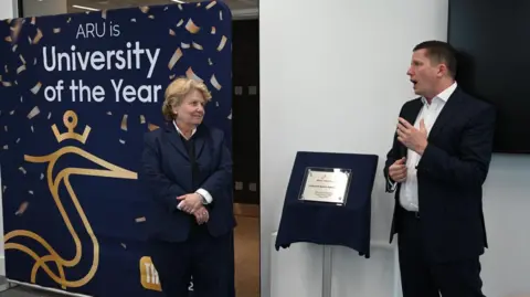 ARU Peterborough Sandi Toksvig along with Ross Renton