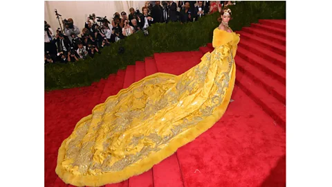 Getty Images Guo dressed Rihanna for the Met Ball in 2015 in a spectacular yellow cape with long train (Credit: Getty Images)
