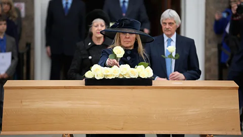 Getty Images Following his discovery, Richard III was ceremonially reburied at Leicester Cathedral in 2015; here, the real Philippa Langley lays a rose on his coffin (Credit: Getty Images)