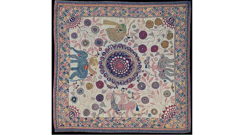 Alamy A Bengali embroidered kantha quilt from the 19th Century portrays typical animal and floral motifs in a variety of stitches (Credit: Alamy)