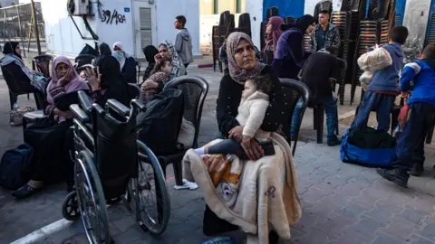 EPA Palestinian patients wait before an evacuation organized by the World Health Organization (WHO) at the European Hospital in Khan Younis, in the southern Gaza Strip, (6 November 2024)