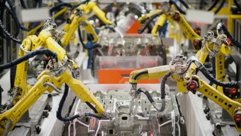 Getty Images Automation at a factory