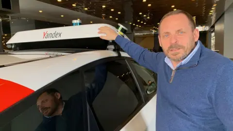 BBC Yandex founder Arkady Volozh with one of the firm's self-driving cars
