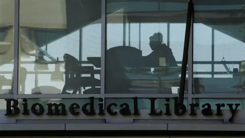 Reuters student in University of California San Diego biomedical library