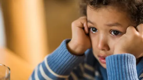 Getty Images Young boy crying