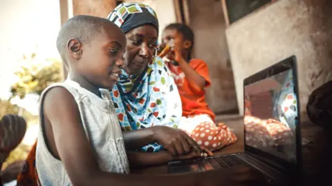 Getty Images A child using a computer in South Africa
