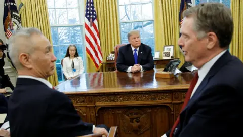 Getty Images Liu He and Robert Lighthizer with Donald Trump